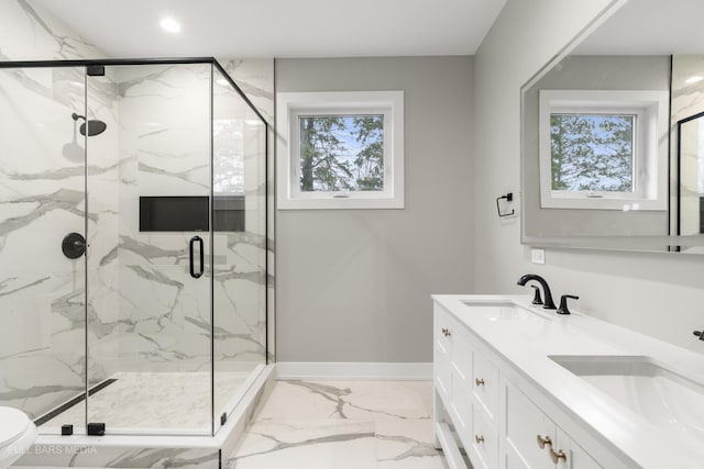 bathroom featuring toilet, walk in shower, and vanity