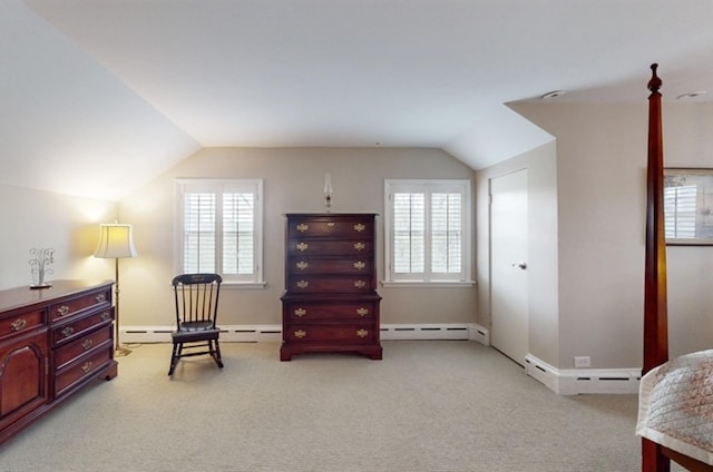 living area with light carpet, vaulted ceiling, and a baseboard radiator