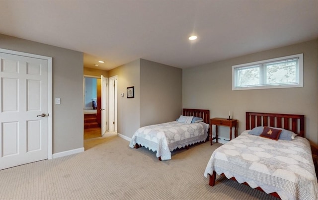 bedroom with light carpet