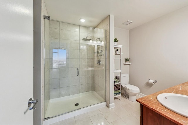 bathroom featuring an enclosed shower, tile patterned floors, vanity, and toilet