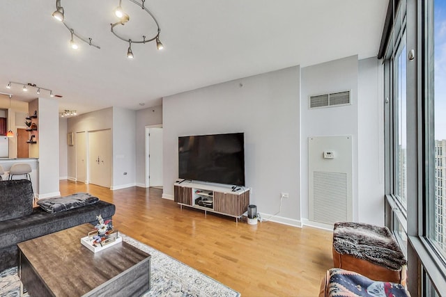 living room with hardwood / wood-style floors