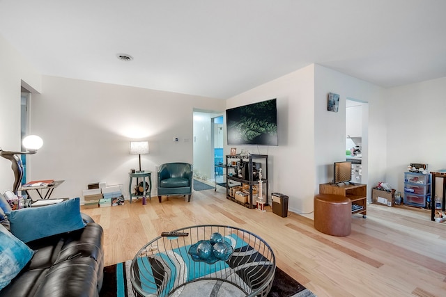 living room with hardwood / wood-style flooring