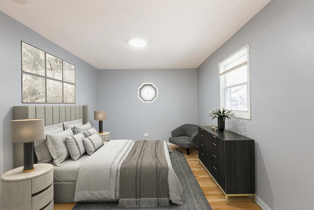 bedroom featuring light hardwood / wood-style flooring