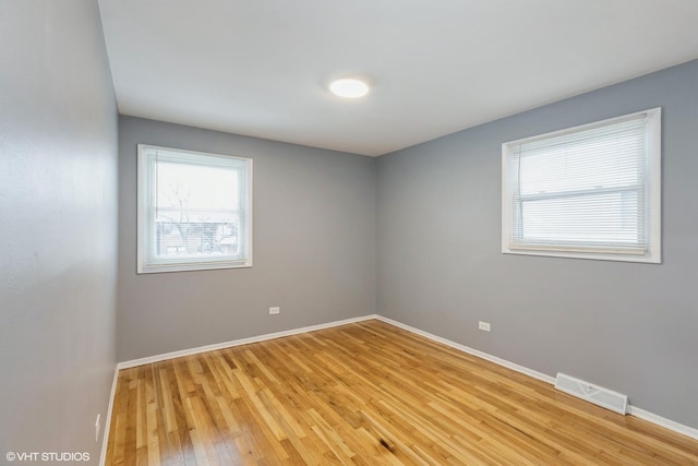 empty room featuring light hardwood / wood-style flooring