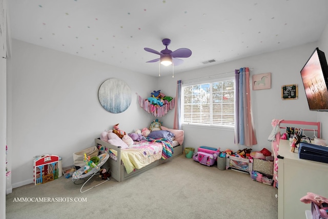 carpeted bedroom with ceiling fan