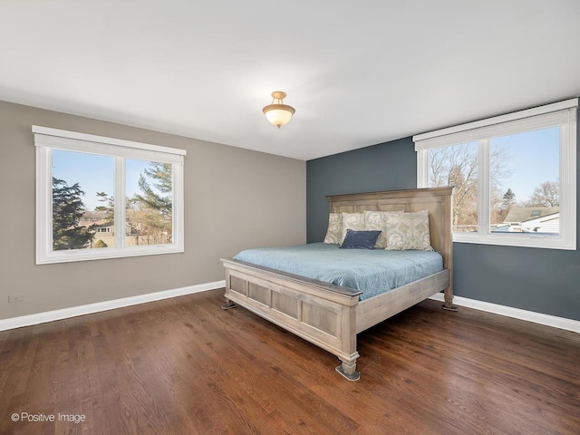 bedroom featuring dark hardwood / wood-style flooring