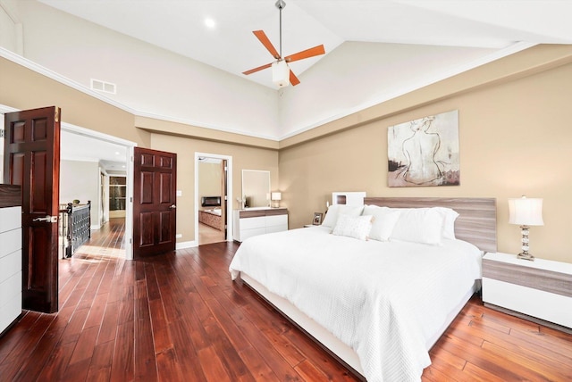 bedroom featuring ceiling fan, dark hardwood / wood-style flooring, and high vaulted ceiling