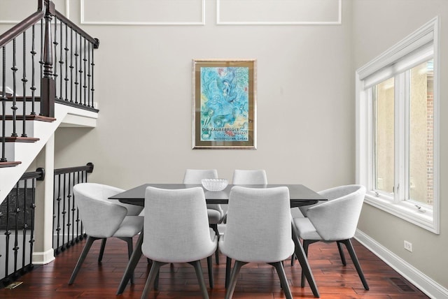 dining room featuring dark wood-type flooring