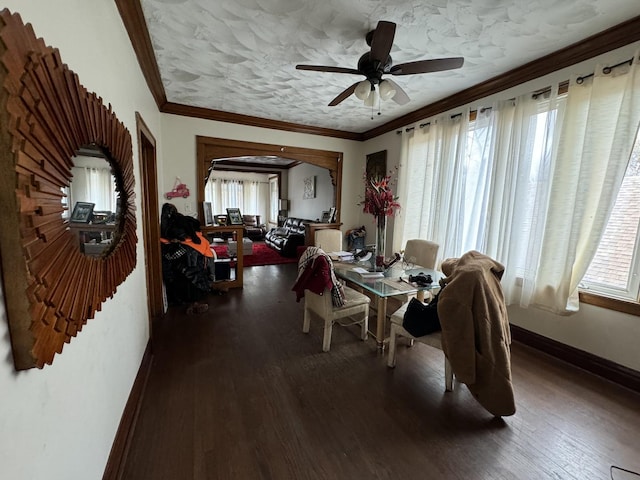 dining space featuring ceiling fan, crown molding, and wood-type flooring