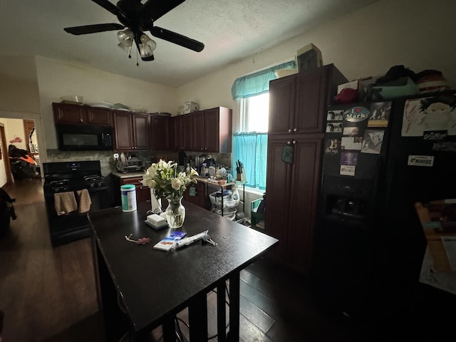 kitchen featuring black appliances, a textured ceiling, dark brown cabinets, ceiling fan, and dark hardwood / wood-style floors