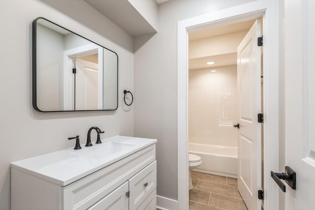 full bathroom with bathing tub / shower combination, toilet, and vanity