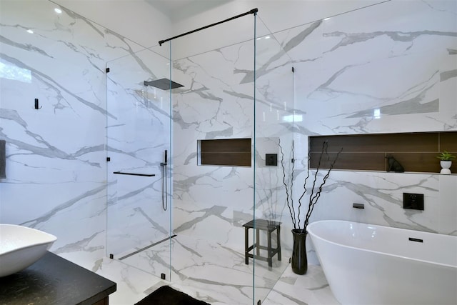 bathroom featuring sink and shower with separate bathtub