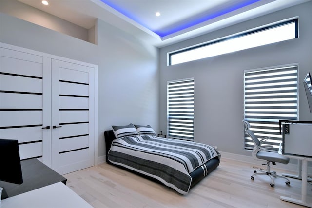 bedroom with light hardwood / wood-style floors