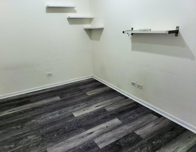 washroom with dark wood-type flooring