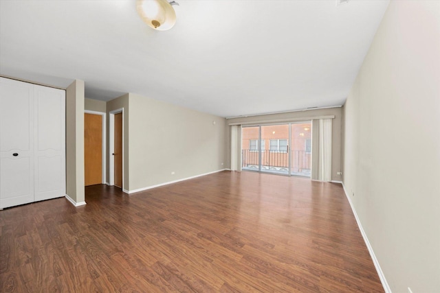 interior space featuring a closet and dark hardwood / wood-style floors