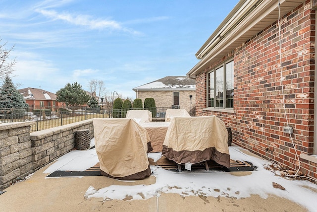 view of snow covered patio