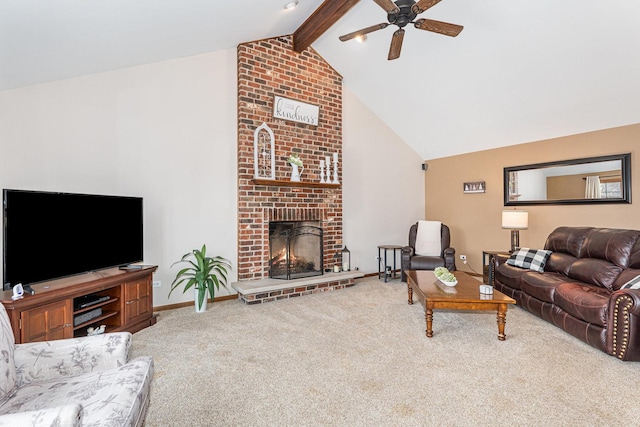 carpeted living room featuring a brick fireplace, lofted ceiling with beams, and ceiling fan