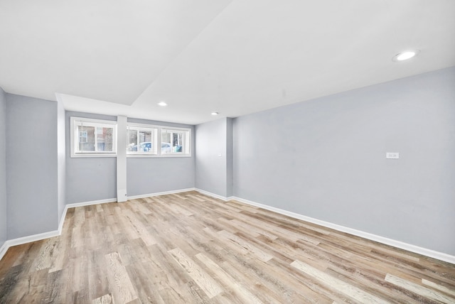 spare room with light wood-type flooring