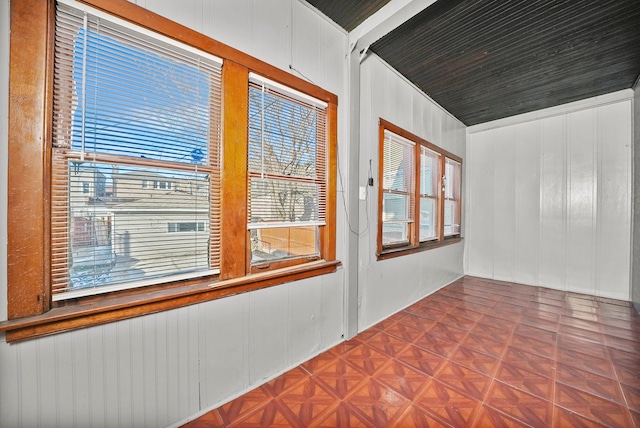 unfurnished sunroom with plenty of natural light