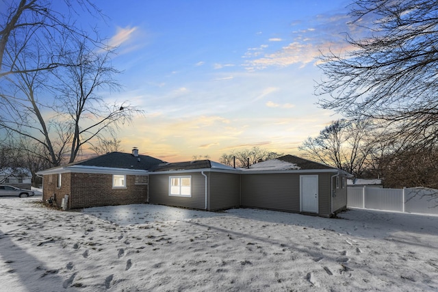 view of snow covered property