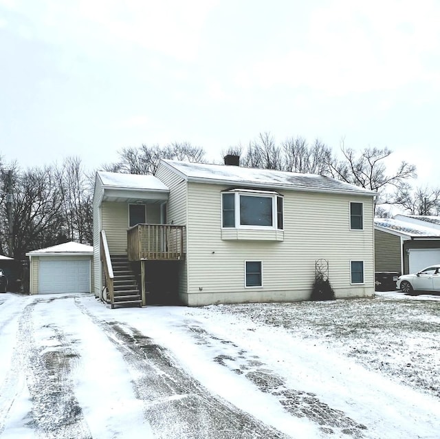 view of front facade with a garage and an outdoor structure