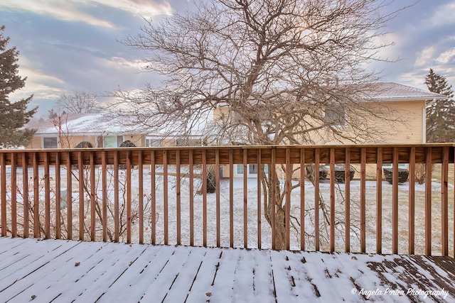 view of snow covered deck