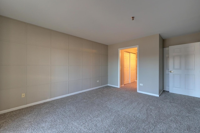 unfurnished bedroom with carpet floors