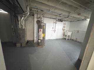 basement featuring gas water heater