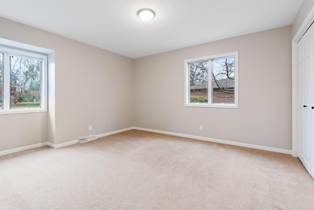 view of carpeted spare room