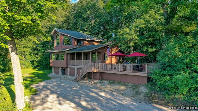 view of front of home with a deck