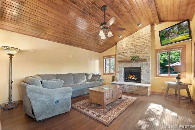 living room with wood ceiling, a stone fireplace, dark hardwood / wood-style floors, high vaulted ceiling, and beam ceiling