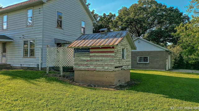 view of home's exterior featuring a yard