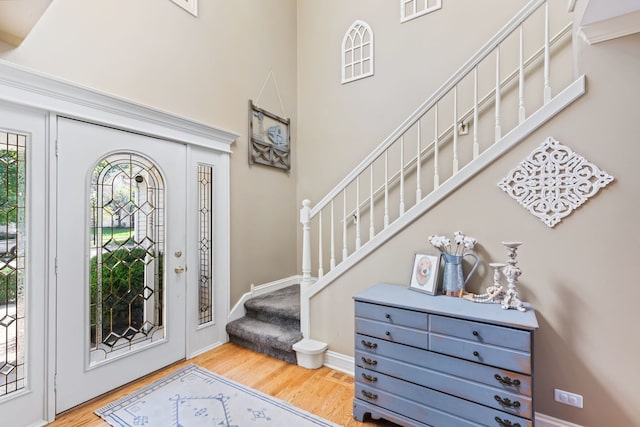 entrance foyer with hardwood / wood-style floors