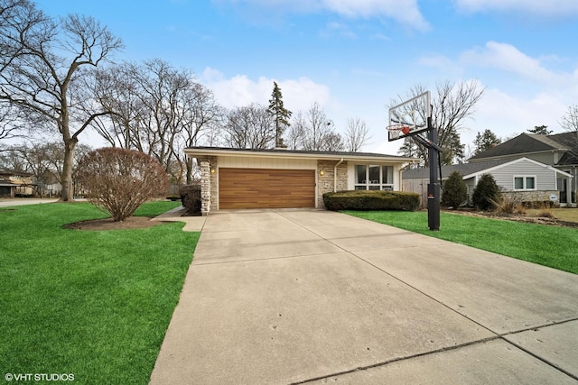 ranch-style house featuring a garage and a front yard