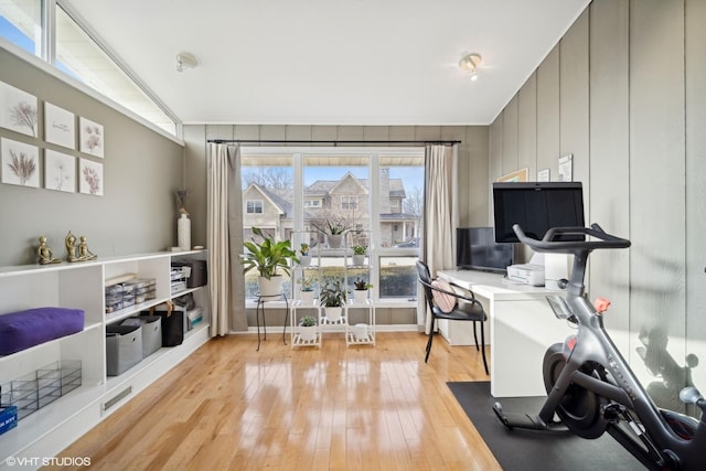 workout room featuring light hardwood / wood-style floors