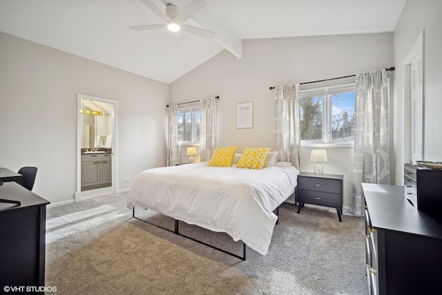 bedroom featuring lofted ceiling with beams, ensuite bath, ceiling fan, and carpet floors