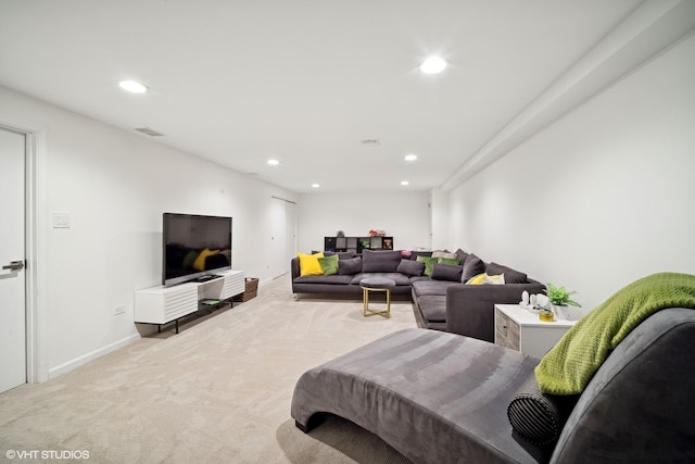 living room featuring light colored carpet