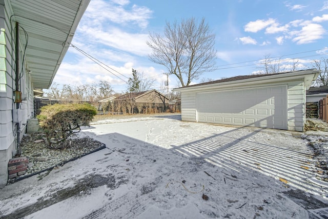 view of yard with an outbuilding and a garage