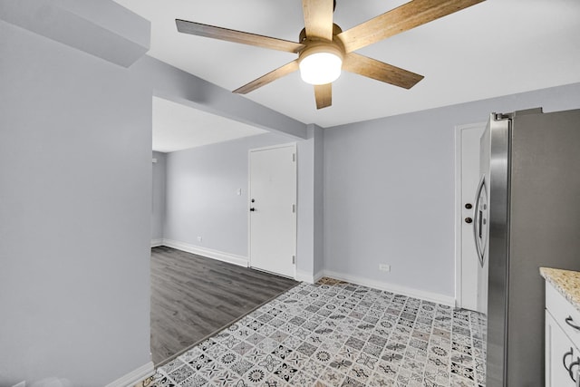 unfurnished room featuring ceiling fan