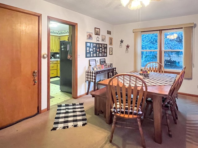 view of carpeted dining room