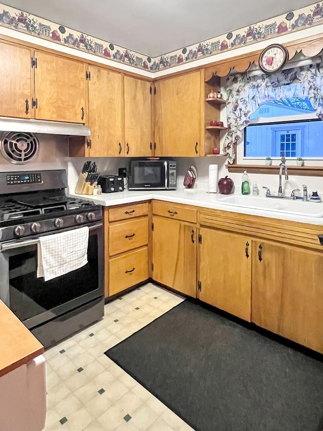 kitchen with sink and gas range