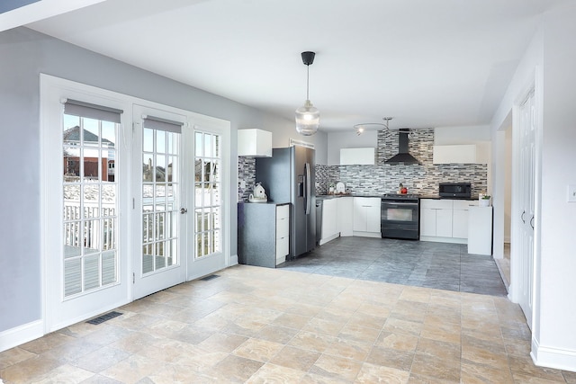 kitchen featuring decorative light fixtures, wall chimney exhaust hood, white cabinetry, decorative backsplash, and stainless steel appliances