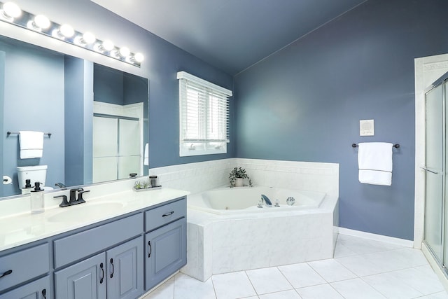 bathroom featuring tile patterned floors, vanity, lofted ceiling, and shower with separate bathtub