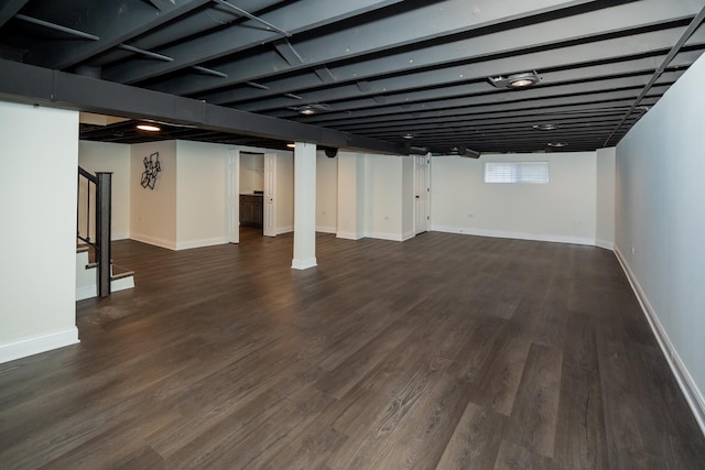 basement featuring dark wood-type flooring