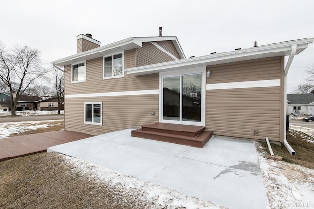 view of snow covered house