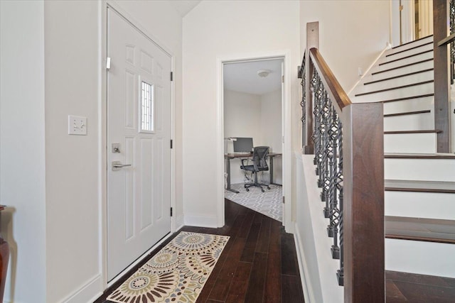 entrance foyer featuring dark hardwood / wood-style flooring