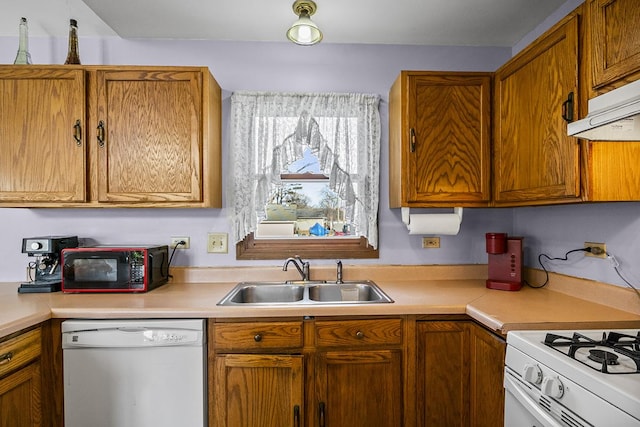 kitchen with white appliances and sink