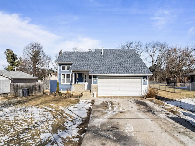 view of front of property with a garage