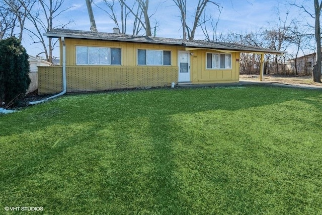 exterior space with a yard