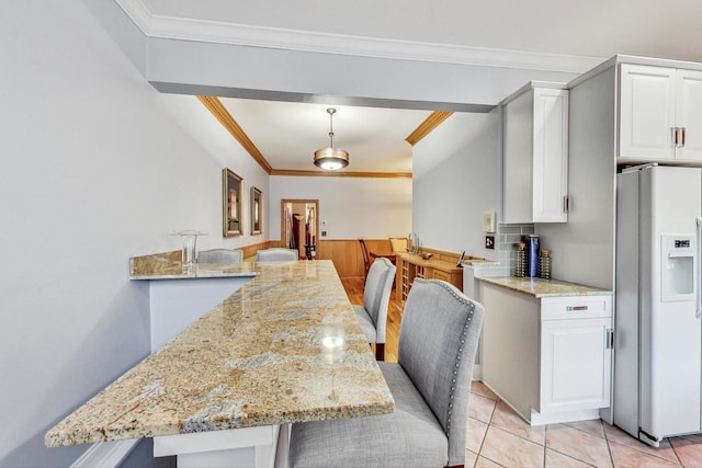 4332 N Kenmore Ave, Chicago, IL 60613 - tiled dining space with ornamental molding